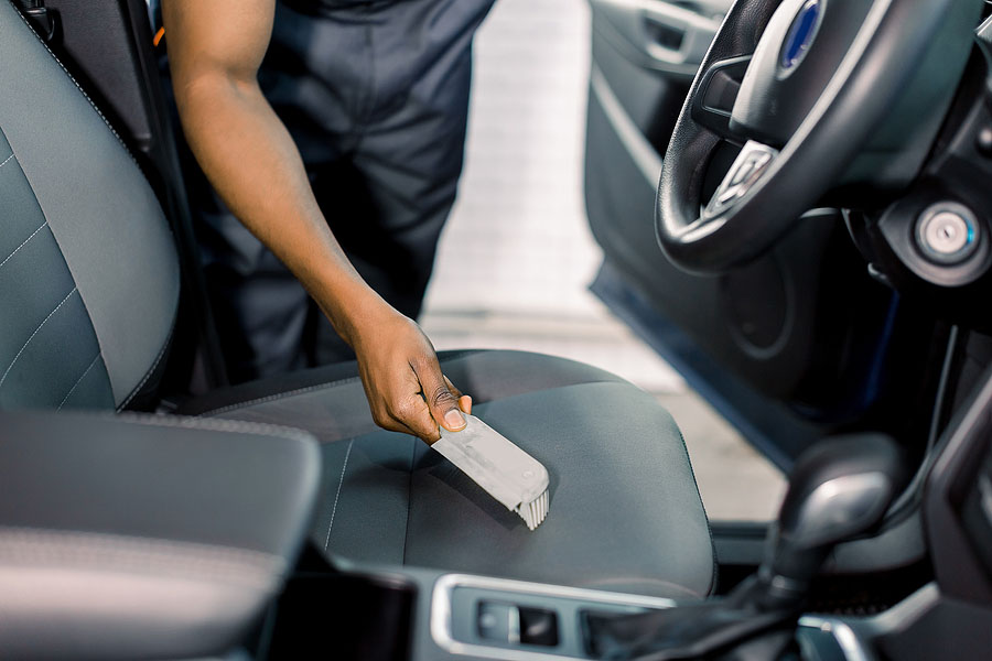 Hand-Of-Car-Service-removing-dog-hair